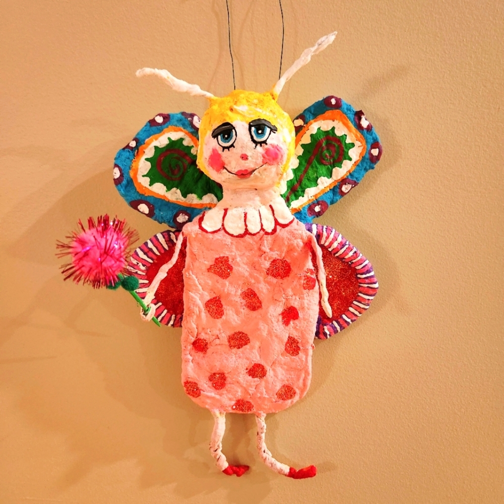 New handmade spun cotton butterfly girl.